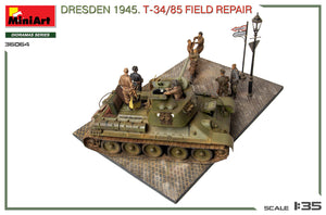 Vista lateral derecha de la maqueta del tanque soviético T-34/85 con diorama ambientado en Dresden en 1945 mientras le hacen labores de mantenimiento en escala 1/35 de Miniart referencia 36064